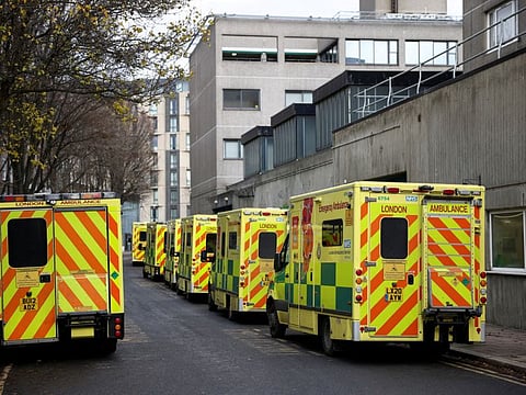 A view of ambulances parked along a street, as ambulance workers strike, amid a dispute with the government over pay, near the NHS London Ambulance Service, in London, on December 21, 2022.  
