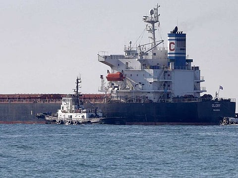 In this file photo the Marshall Islands-flagged bulk carrier M/V Glory leaves the Ukrainian port of Chornomorsk on August 7, 2022. - The Norwegian cargo vessel has run aground in the Suez Canal and authorities are attempting to refloat the ship, shipowner Leth said on January 9. "M/V Glory grounded while joining Southbound convoy near to al-Qantarah. Suez Canal Authority tugs are currently trying to refloat the vessel", the company wrote on Twitter. 