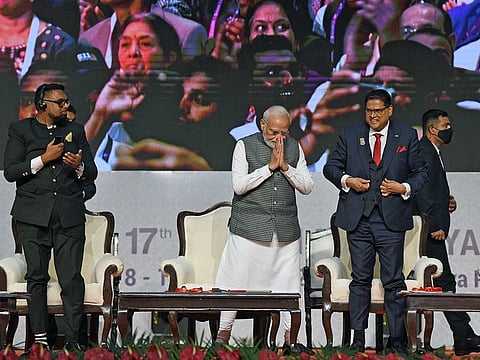 India's Prime Minister Narendra Modi greets the audience at the 17th Pravasi Bharatiya Divas Convention, in Indore on Monday, Jan 9, 2023