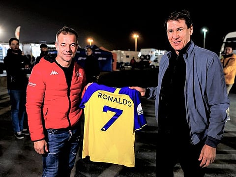 BRX driver Sebastien Loeb (left) was delighted to be presented with a Cristiano Ronaldo shirt by Al Nassr coach Rudi Garcia during the rest day of the Dakar Rally.