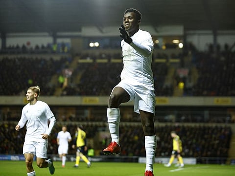 Arsenal's Eddie Nketiah celebrates scoring their third goal.