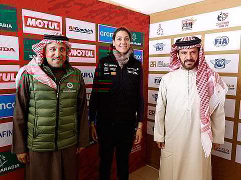 Prince Khalid bin Sultan Al-Abdullah Al-Faisal, Chairman of the Saudi Automobile and Motorcycle Federation (left) with Dania Akeel, 2023 Dakar T3 competitor, 2021 FIA World Cup for Cross-Country Bajas T3 driver champion (centre) and FIA President Mohammed Ben Sulayem.