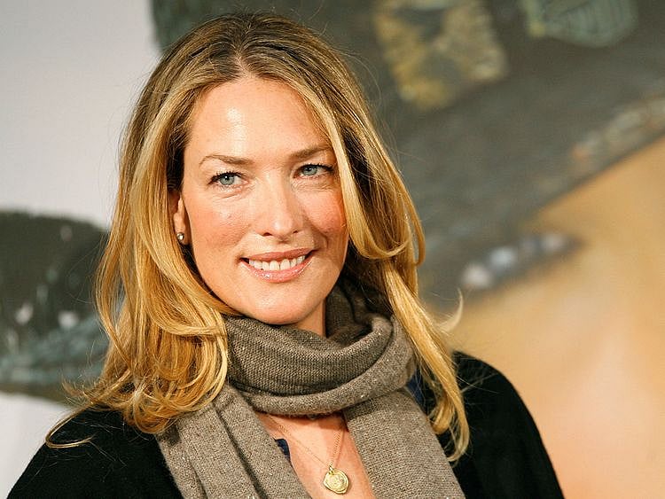 German model Tatjana Patitz smiles as she presents the new catalogue of the OTTO group in Hamburg December 14, 2006.