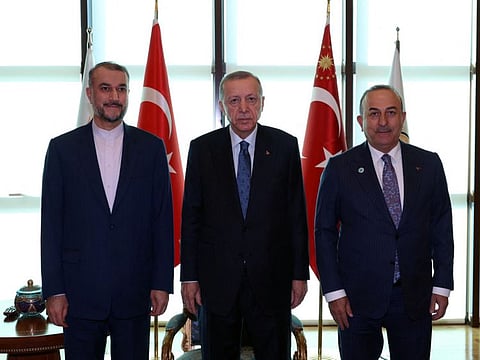 Turkey's President Tayyip Erdogan and Turkish Foreign Minister Mevlut Cavusoglu during their meeting with Iranian Foreign Minister Hossein Amir-abdollahian in Ankara, Turkey, January 17, 2023. 