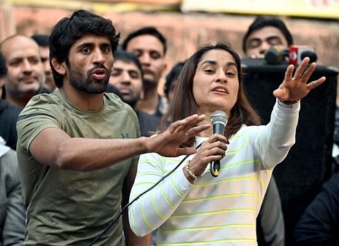 Wrestlers Vinesh Phogat and Bajrang Punia address a press conference during a protest for the second day against the Wrestling Federation of India (WFI) and its chief Brij Bhushan Sharan Singh against whom sexual harassment allegations were made, at Jantar Mantar, in New Delhi on Thursday, January 19, 2023.