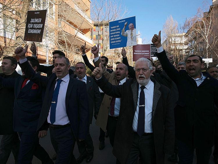 Protesters chant slogans during a demonstration outside the Swedish embassy in Ankara, Turkey, on Saturday. 