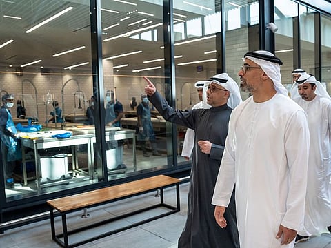 Sheikh Khaled bin Mohamed bin Zayed Al Nahyan (right) during the tour 
