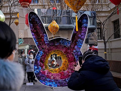 People across China rang in the Lunar New Year on Sunday with large family gatherings and crowds visiting temples after the government lifted its strict 'zero-COVID' policy.