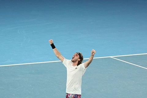 Greece's Stefanos Tsitsipas celebrates after winning against Italy's Jannik Sinner in Melbourne on Sunday.