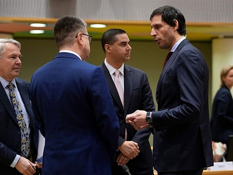 Netherland's Foreign Minister Wopke Hoekstra, right, speaks with Sweden's Foreign Minister Tobias Billstrom, centre, and Finland's Foreign Minister Pekka Haavisto, left, during a meeting of EU foreign ministers at the European Council building in Brussels on Monday, Jan. 23, 2023.