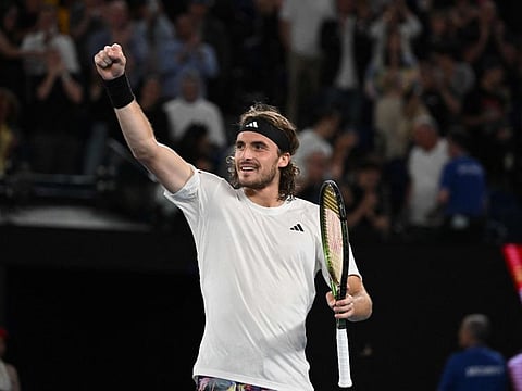 Greece's Stefanos Tsitsipas celebrates after his victory over Czech Republic's Jiri Lehecka in their men's singles quarter-final match on day nine of the Australian Open in Melbourne.