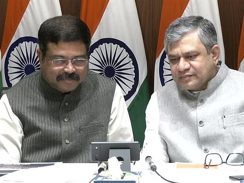 Union Minister for Communications, Electronics and Information Technology and Union Education Minister Dharmendra Pradhan (left) tests ‘BharOS’, Made In India mobile operating system developed by IIT Madras. Union Telecom Minister Ashwini Vaishnaw (right) was also present at the event. 