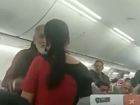  In the video, the flight crew and passengers are seen involved in a verbal fightafter a male passenger allegedly behaved inappropriately with a female crew member.