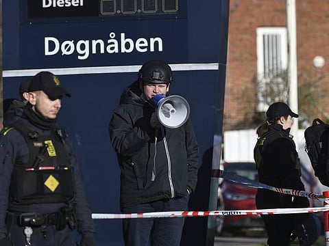Far-right activist Rasmus Paludan speaks on a megaphone in front of a mosque in the Noerrebro area of Copenhagen, Denmark on Friday January 27, 2023.