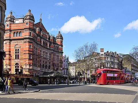 A view of Cambridge Circus with Palace Theatre on left, Charing Cross Road, London. [Illustrative image]