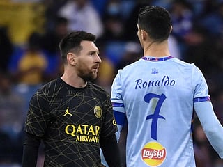 Lionel Messi (left) has been voted as the best footballer of 2022, but arch-rival Cristiano Ronaldo did not even make the top 50.