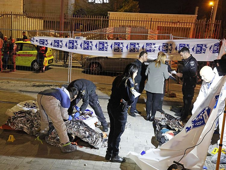 Israeli emergency personnel help victims 