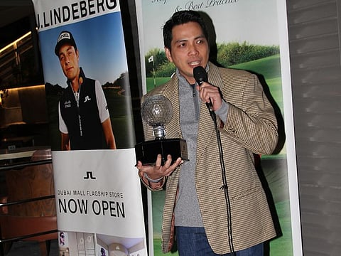 Joey Halago, winner of the 2022 FIGME Order of Merit, with his trophy.