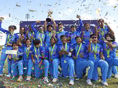 India players celebrate with the trophy after winning the U19 Women's T20 World Cup final against England, at Senwes Park, in Potchefstroom.
