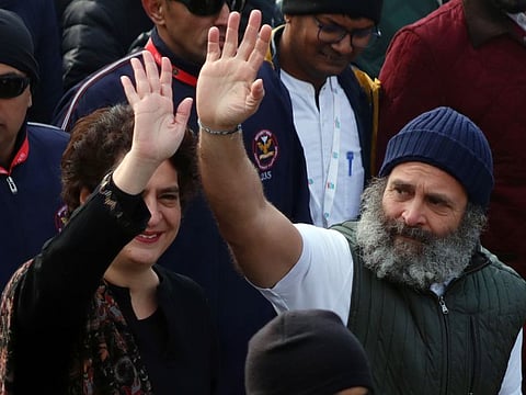 Congress leader Rahul Gandhi with his sister and party general secretary Priyanka Gandhi Vadra waves to the crowd during the party's Bharat Jodo Yatra, in Srinagar on Sunday, January 29, 2023.
