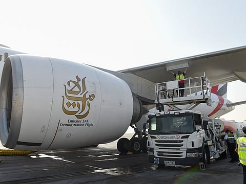 One engine of Emirates Boeing 777-300ERbeing filled with 100 per cent Sustainable Aviation Fuel (SAF) before its first demonstration flight at Dubai airport on Monday.