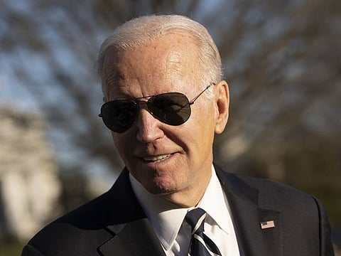 US President Joe Biden speaks to members of the media on the South Lawn of the White House in Washington, DC,  on Monday.
