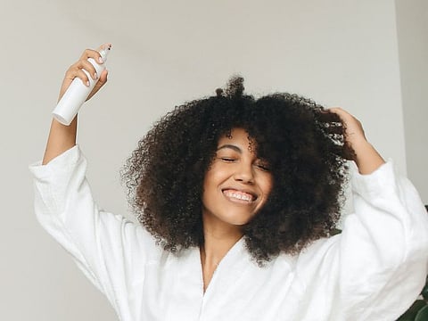 Always carry a bottle of dry shampoo to give your hair the boost it deserves whenever you're in a rush.