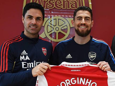 Arsenal coach Mikel Arteta (left) with new signing Jorginho.