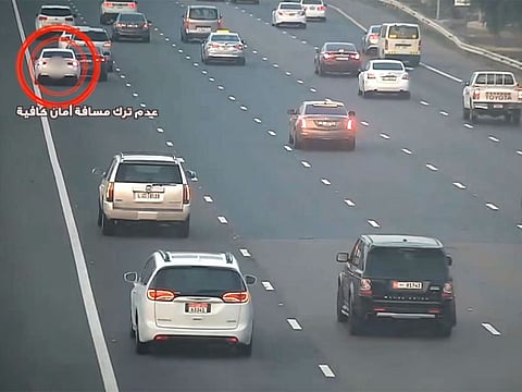 The driver of the circled car was found overtaking from the right in a reckless manner, overtaking vehicles using the shoulders of the road, and failing to maintain sufficient distance from vehicles in front