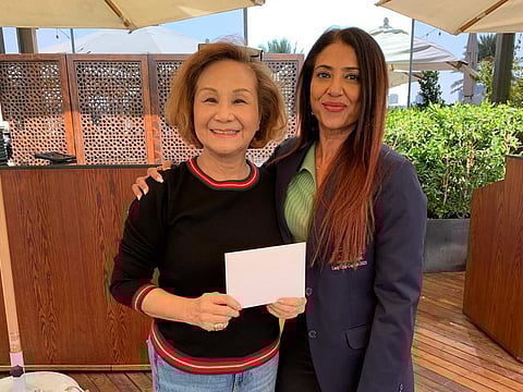 Overall winner Mego Han (left) with Dubai Creek Lady Captain Shiba Wahid