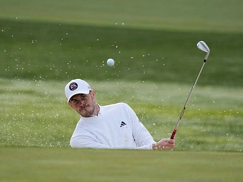 Gareth Bale hits his bunker shot on the first hole during the first round of the AT&T Pebble Beach Pro-Am.