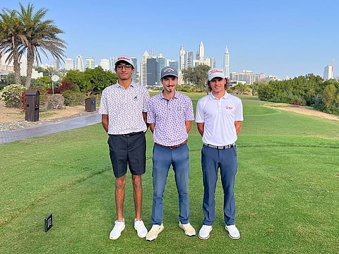 Round two leader of the Montgomerie Golf Club Dubai Men's Open, James Nash (right), with playing partners Dan Byrne (centre) and Raghav Gulati.