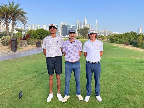 Round two leader of the Montgomerie Golf Club Dubai Men's Open, James Nash (right), with playing partners Dan Byrne (centre) and Raghav Gulati.