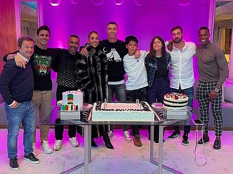 Cristiano Ronaldo with family and friends and three birthday cakes!