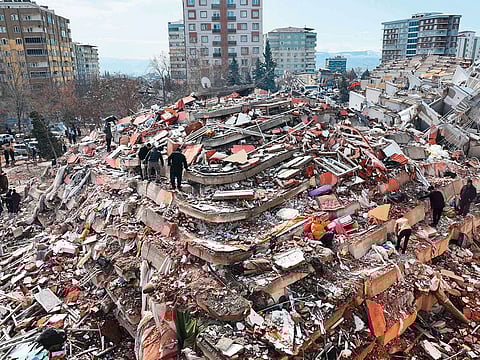 File image: Civilians look for survivors under the rubble of collapsed buildings in Kahramanmaras.