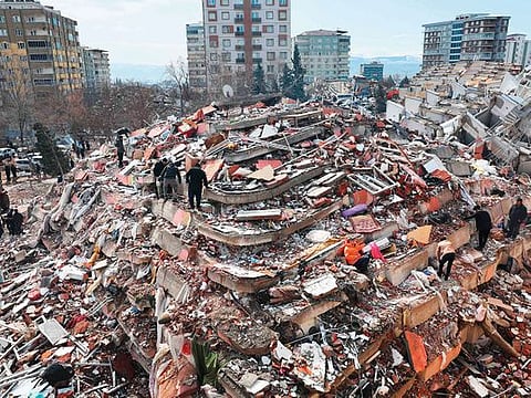 File image: Civilians look for survivors under the rubble of collapsed buildings in Kahramanmaras.