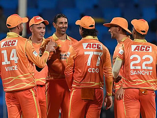 David Wiese (centre) of Gulf Giants celebrates with teammates after claiming a five-wicket haul against Sharjah Warriors at the Sharjah Cricket Stadium. Both teams will kick-start Season 2 at the same venue on January 19.