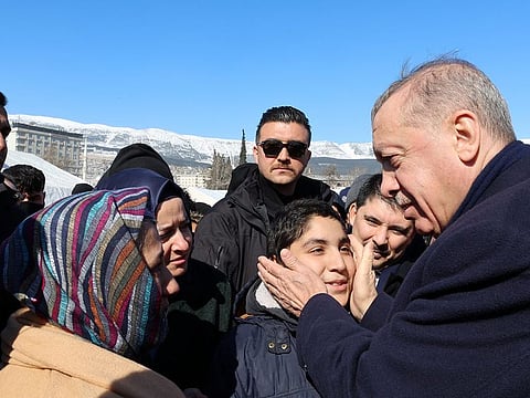 Turkish President Tayyip Erdogan meets with people in the aftermath of a deadly earthquake in Kahramanmaras, Turkey February 8, 2023.  