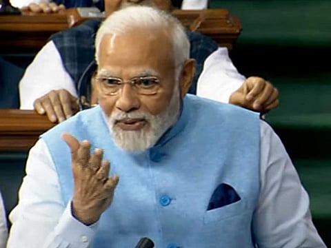 Prime Minister Narendra Modi speaks in Lok Sabha during a discussion on Motion of Thanks on the President's address during the Budget Session of Parliament, in New Delhi on Wednesday, Feb 8, 2023.