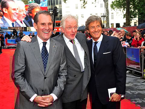 Actor Ben Cross, British filmmaker Hugh Hudson and Nigel Havers appear at the Chariots of Fire Great British Premiere in London on July 10, 2012. Hudson, who debuted as a feature director with the Oscar-winning Olympics drama “Chariots of Fire” and later made such well-regarded movies as “My Life So Far” and the Oscar-nominated “Greystroke,” died Friday in London. He was 86.  (Photo by Jon Furniss/Invision/AP, File)