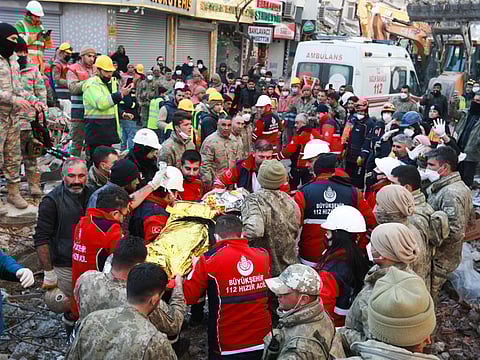 Miraculous rescue after 8 days; the woman is rescue from the rubble of a building some 203 hours after last week's devastating earthquake, in Hatay, Turkey, on February 14, 2023.  