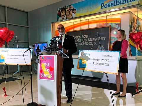 California Lottery Director Alva Johnson announces that Edwin Castro won November's record-high $2.04 billion PowerBall jackpot on Tuesday, Feb. 14, 2023, in Sacramento, California.
