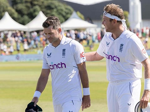 England's James Anderson (left) walks from the field with teammate Stuart Broad after their win during day four of the first cricket Test against New Zealand at Bay Oval in Mount Maunganui.
