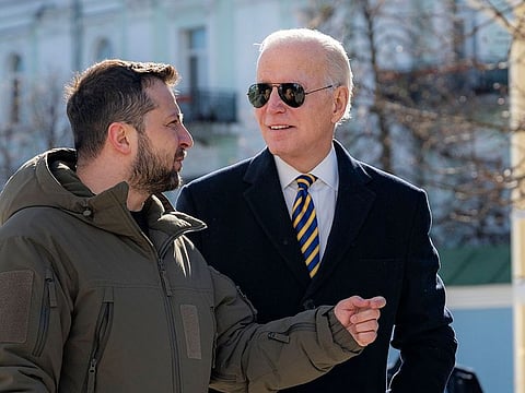 President Joe Biden, right, and Ukrainian President Volodymyr Zelenskyy talk during an unannounced visit in Kyiv, Ukraine, Monday, Feb. 20, 2023.