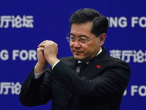 Chinese Foreign Minister Qin Gang gestures to delegations as he arrives at the Lanting Forum on the Global Security Initiative: China's Proposal for Solving Security Challenges held at the Ministry of Foreign Affairs office in Beijing, Tuesday, Feb. 21, 2023. 