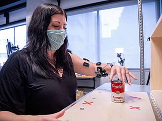 Zaps to spine help 2 stroke survivors move arms