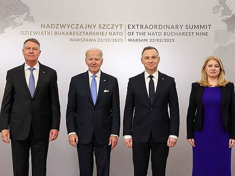 Romania's President Klaus Iohannis, Poland's President Andrzej Duda and Slovakia's President Zuzana Caputova pose with U.S. President Joe Biden, on the day of the NATO Bucharest Nine (B9) Summit at the Presidential Palace in Warsaw, Poland.