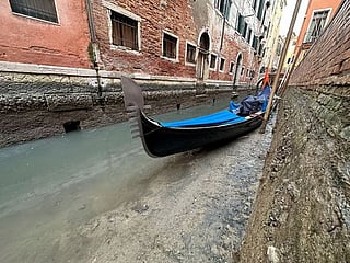 Photos: Prolonged low tides see smaller canals dry up in Venice