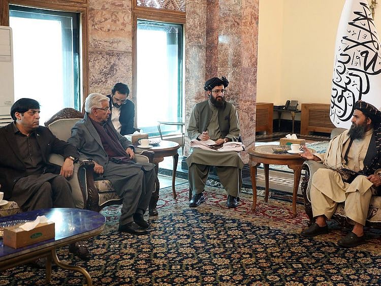 Pakistan’s defence minister Khawaja Muhammad Asif (second left) meets Afghan deputy prime minister, Mullah Abdul Ghani Baradar, in Kabul, Afghanistan, on February 22, 2023.  