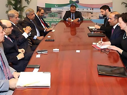 Pakistan’s commerce minister Syed Naveed Qamar (centre left) meets US Special Representative for Commercial and Business Affairs, Dilawar Syed (center right), in Washington, United States, on February 22, 2023.  